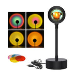 Black desk lamp with color-changing feature and USB cable on a white background