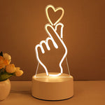 Neon light shaped like a hand with a heart on a brown background
