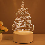 3D cake-shaped night light with 'Happy Birthday' text on a brown background