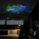 Room with a starry night sky projection on the ceiling, creating a cozy atmosphere.