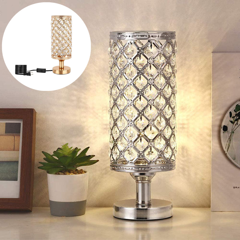 Decorative table lamp with crystal design on a surface, with a close-up inset showing the lamp's base.