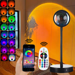Smart LED lamp with remote control and smartphone app on a wooden surface.