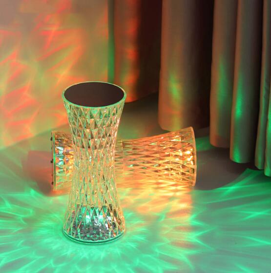 Decorative lamp with colorful light patterns on a floor