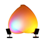 Colorful light bulb-shaped lamp with gradient colors on a white background