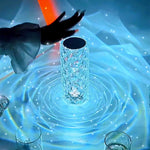 Glass vase with glowing blue light on a blue background