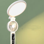 Handheld fan with light and digital display on a gradient background