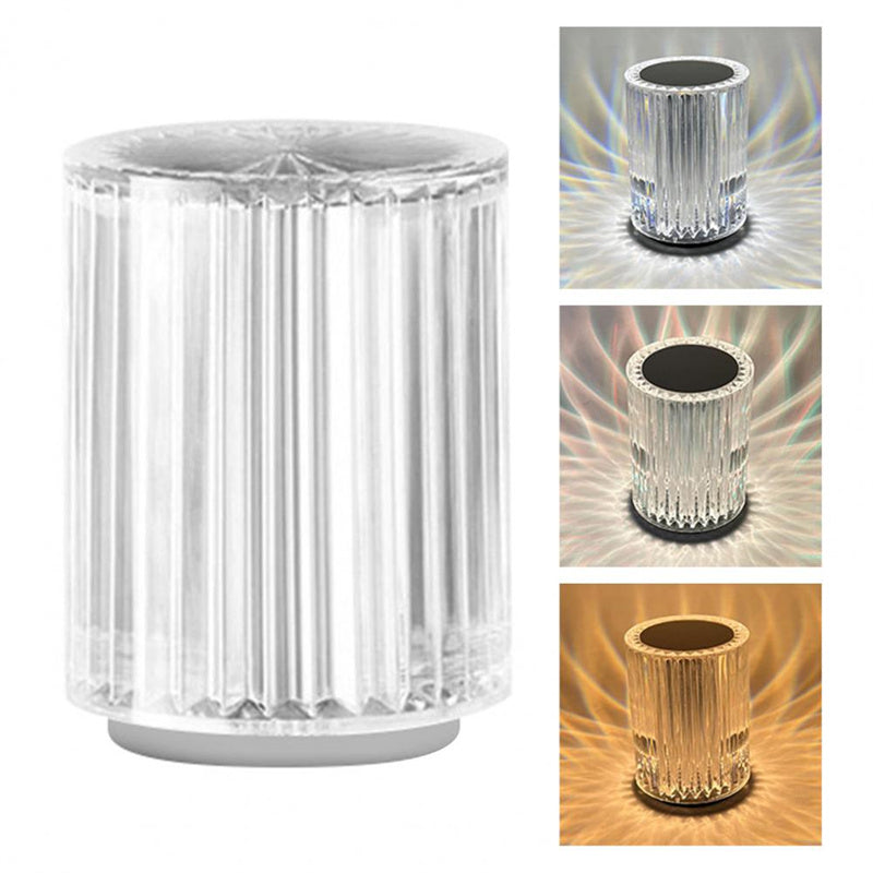 Clear cylindrical light fixture with ribbed design on a white background